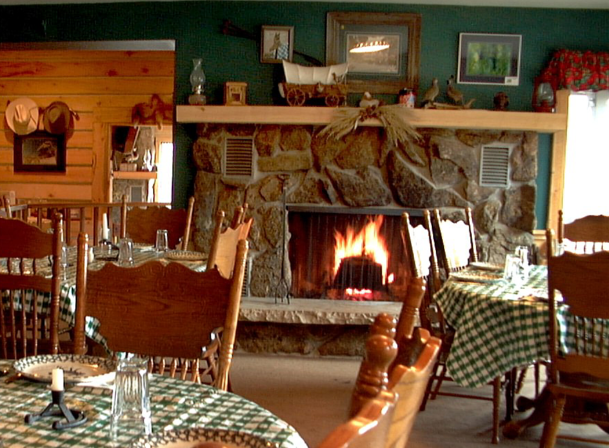 cozy ranch dining room with fire