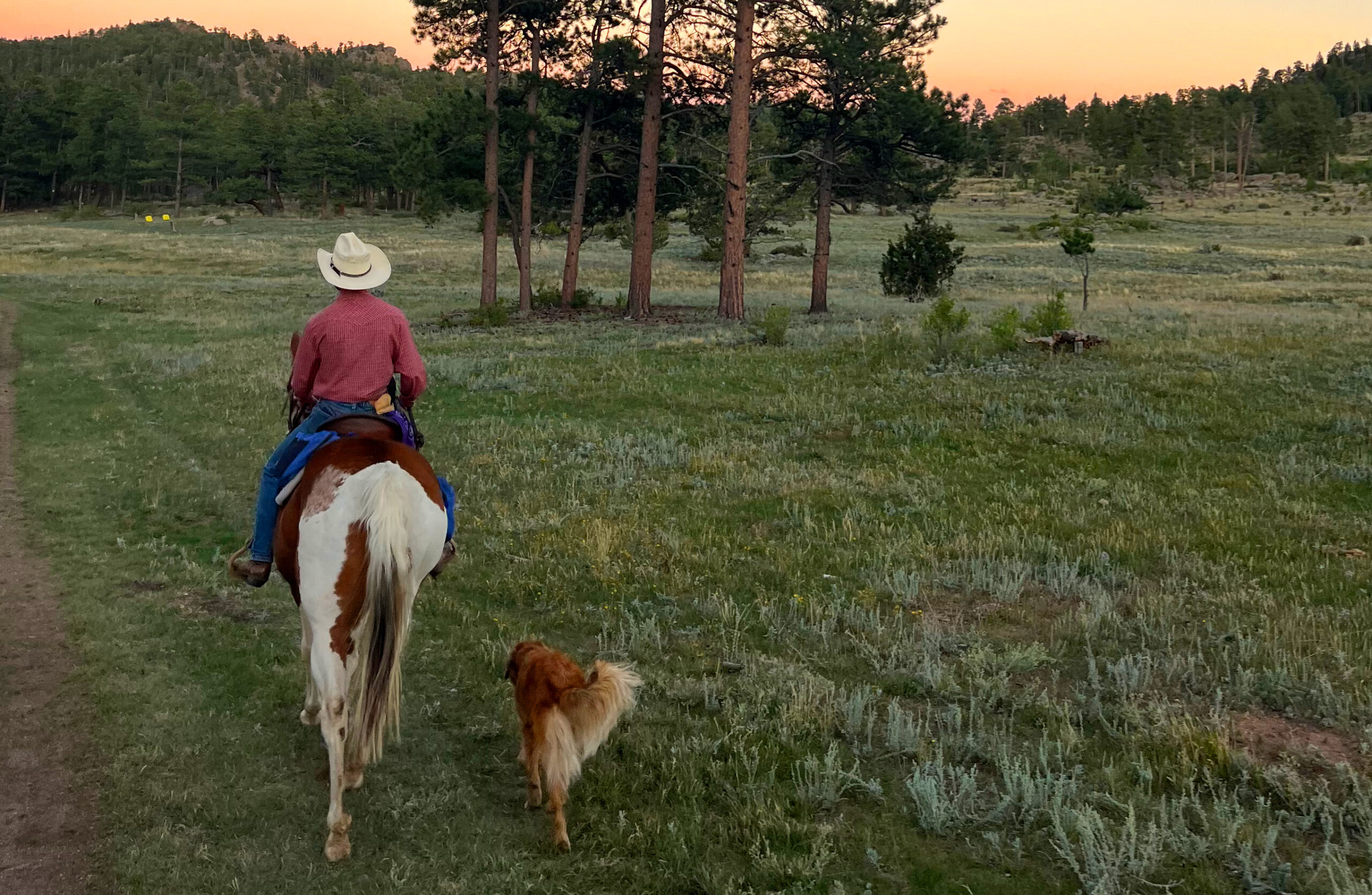 a trail ride with his dog at our pet friendly bed and breakfast